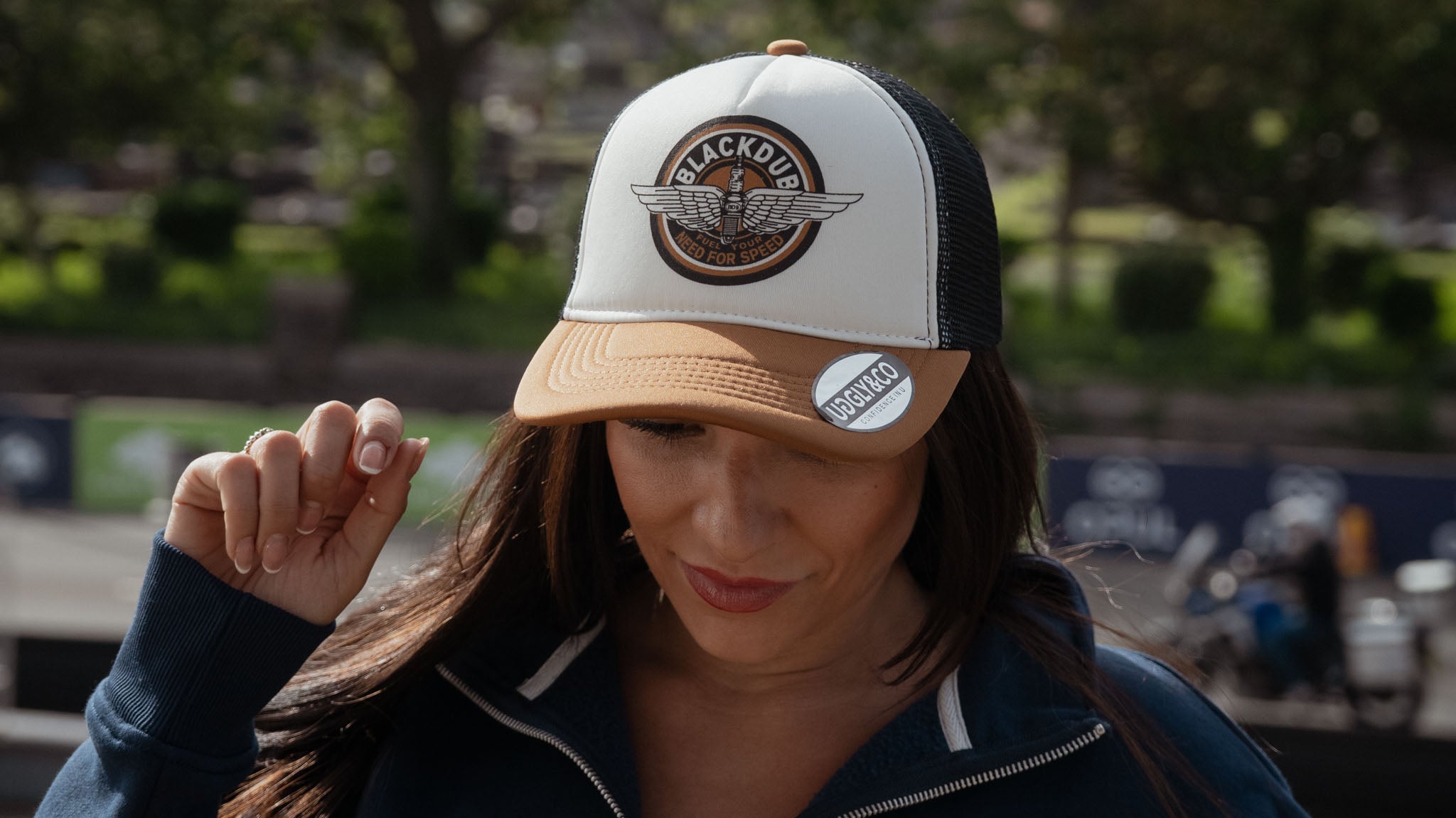 girl pictured at the tt in black dub garage hat
