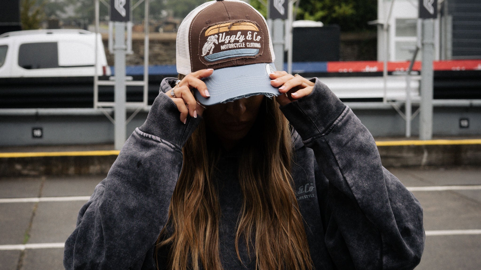 brown and blue flat track cap