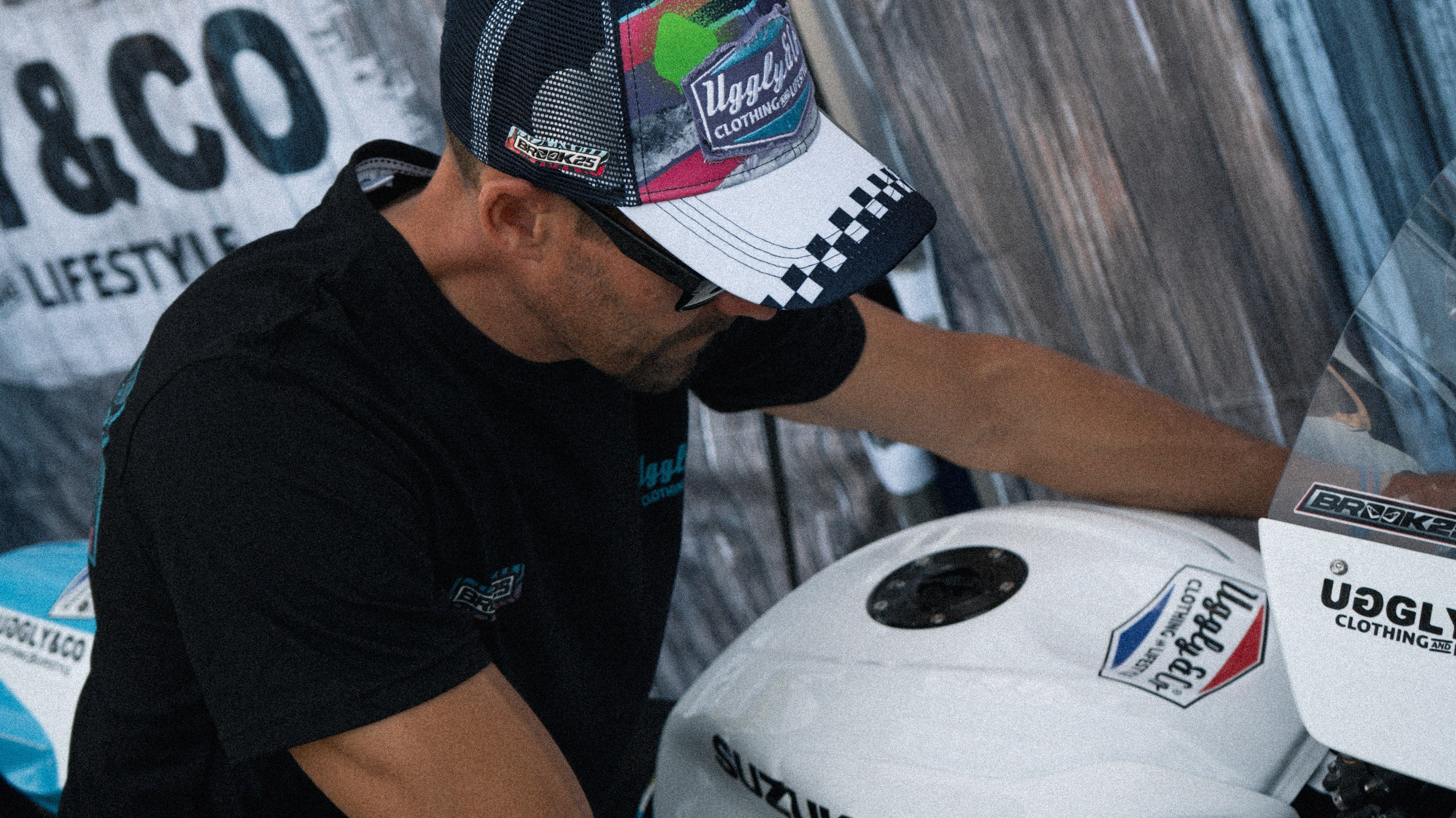 Josh Brookes on his TT bike in motocross inspired trucker hat