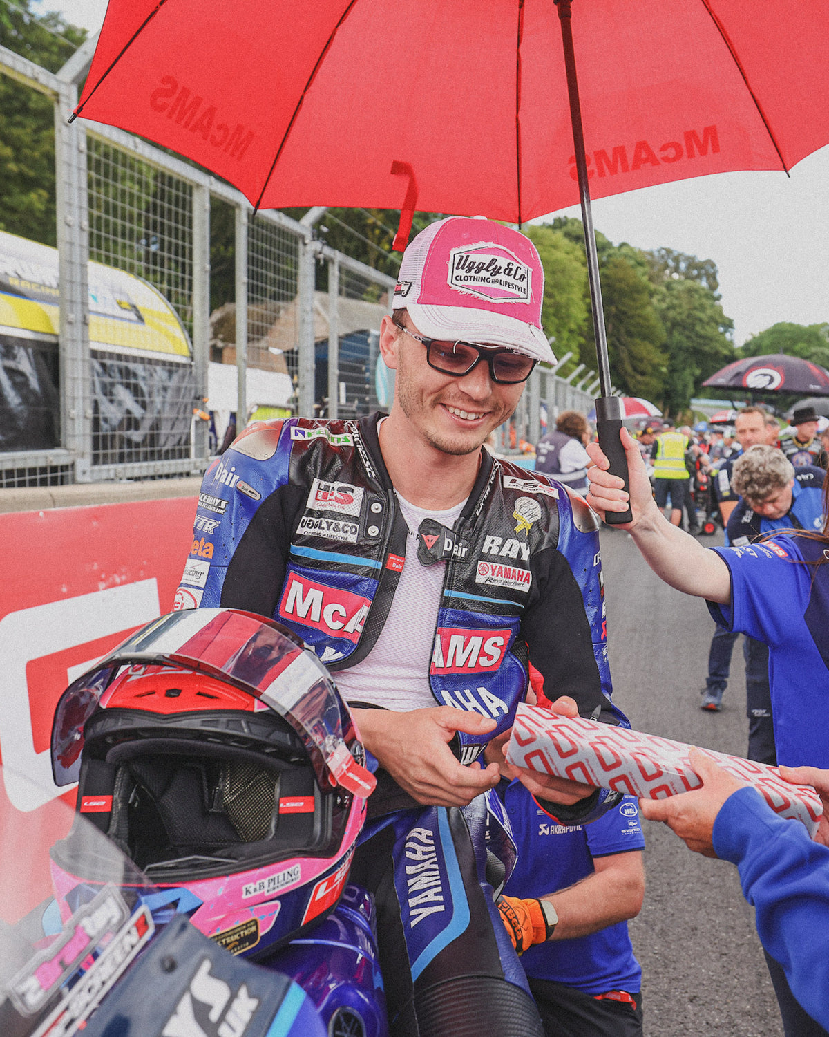 Bradley Ray wearing pink trcker hat on bsb grid