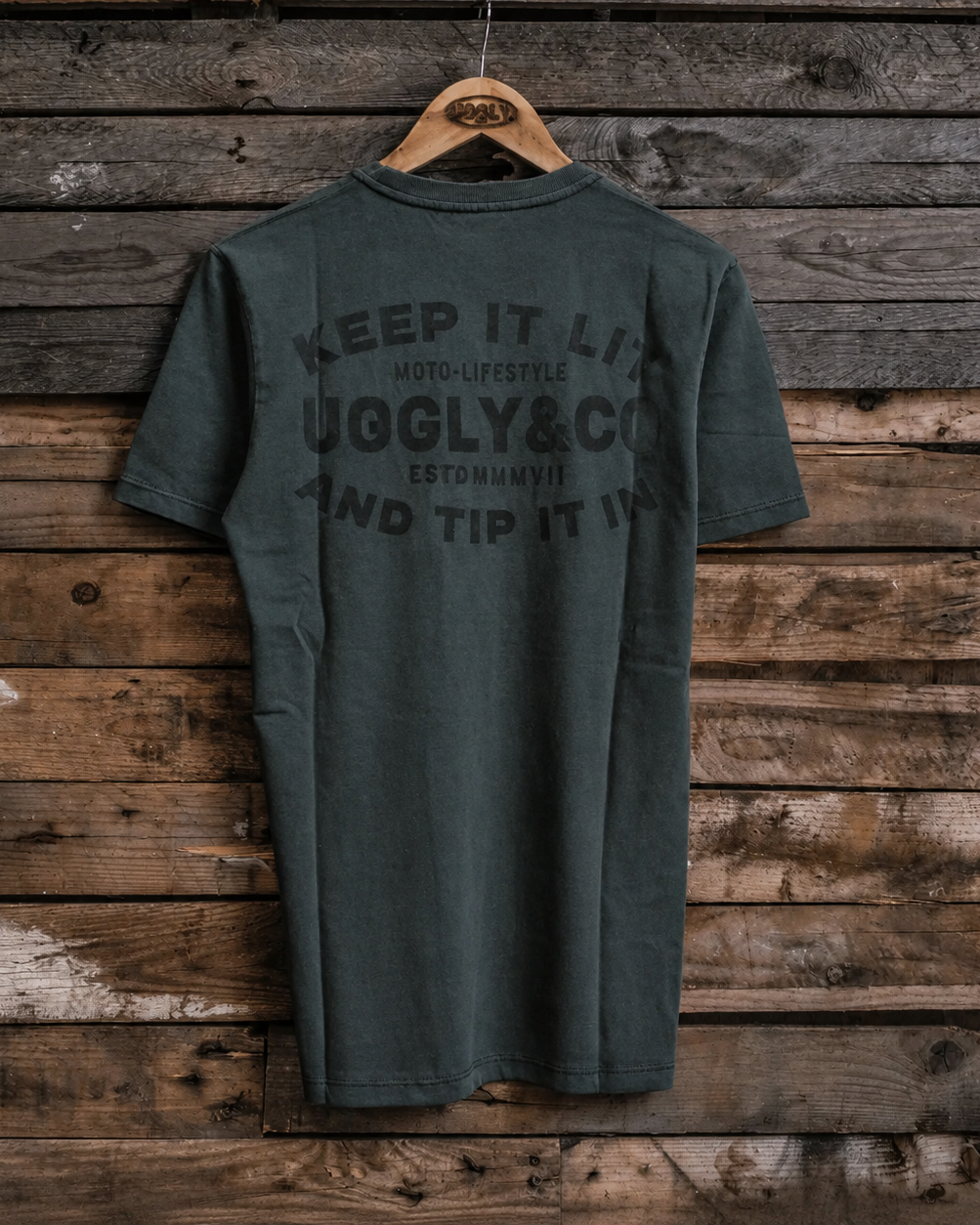 product photo of the uggly and co green keep it lit t shirt rear view