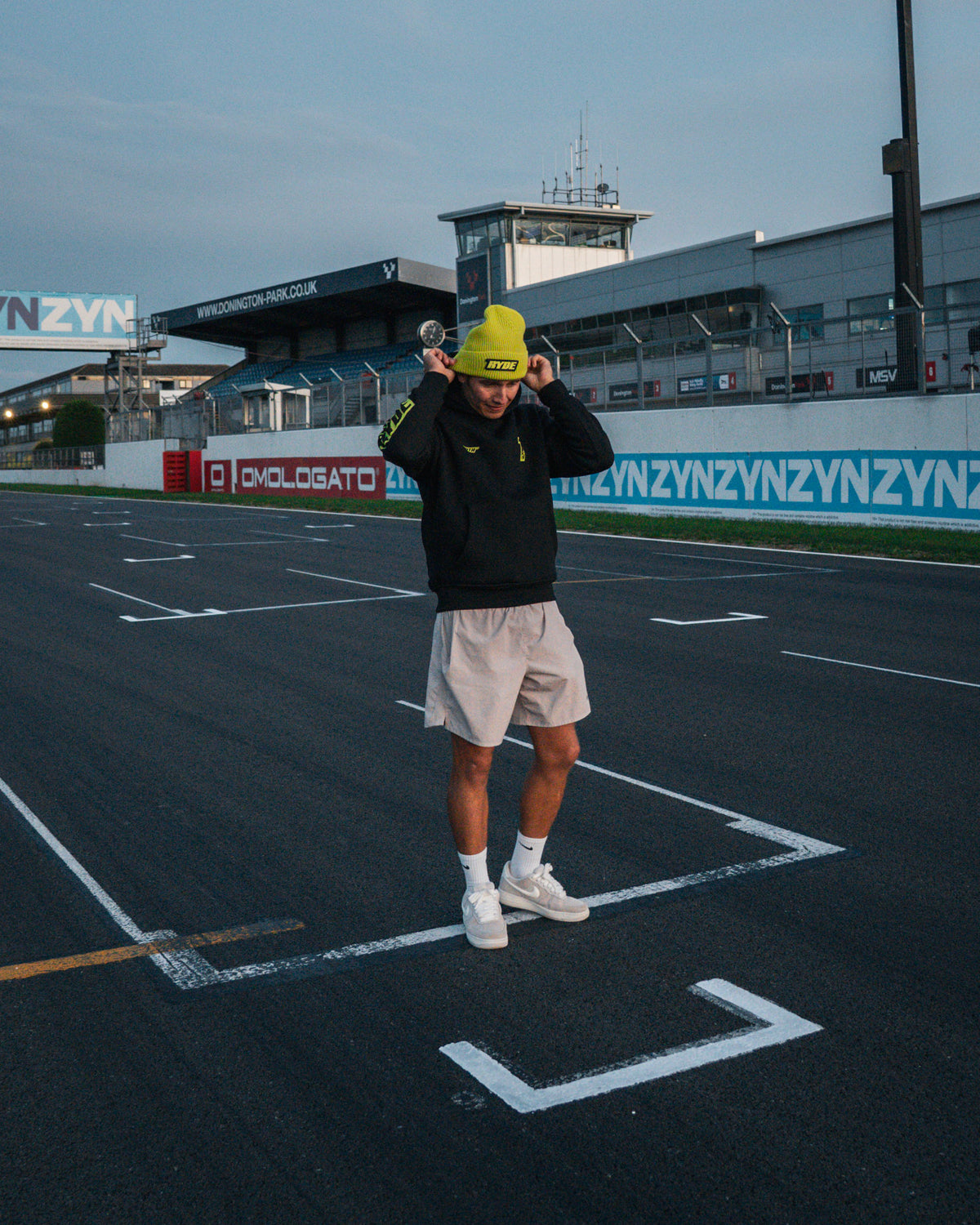 Kyle Ryde at donnington park wearing yellow uggly and co beanie