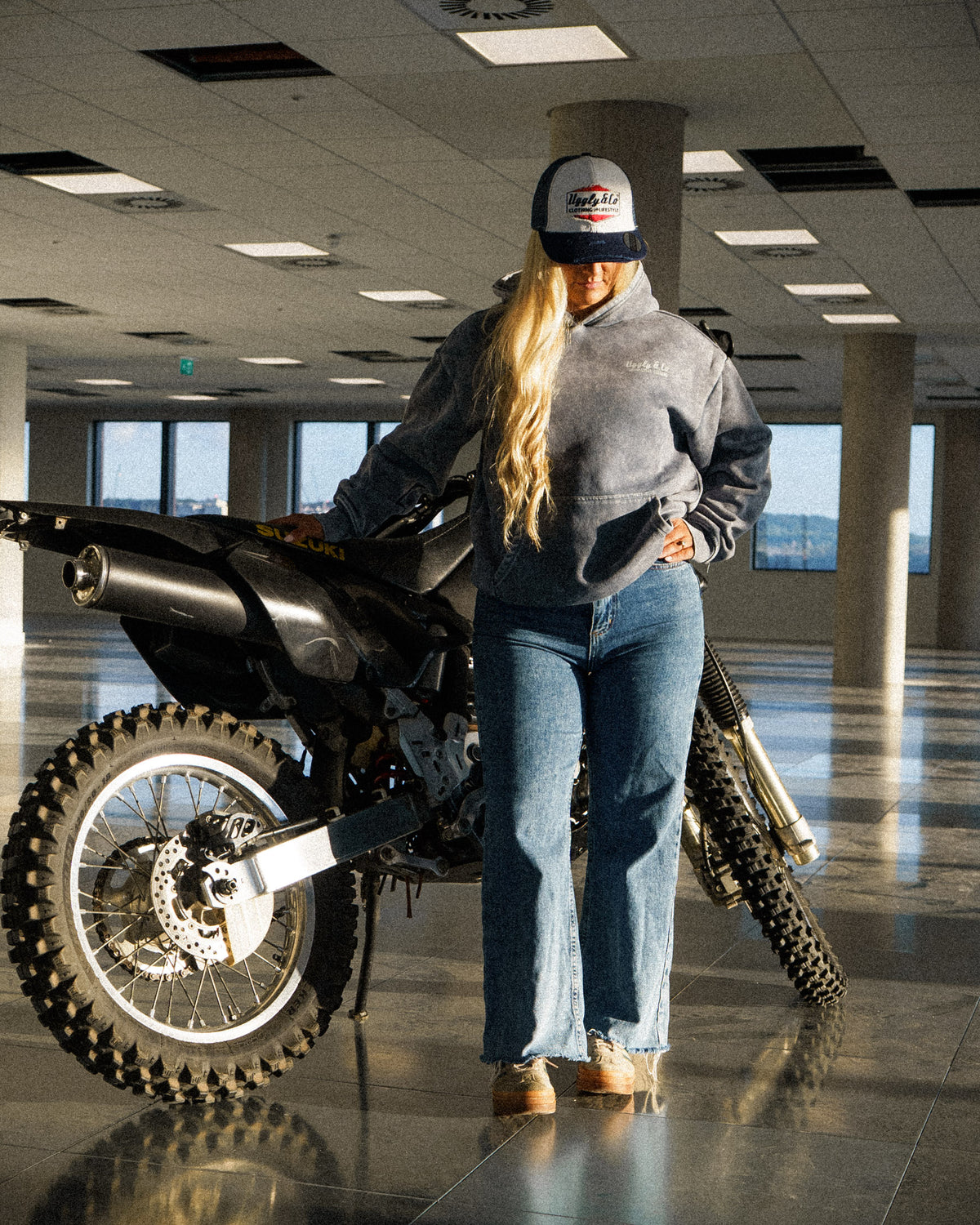 Abby Marshall with Suzuki DRZ wearing the Navy Blue & White Diamond Trucker Hat