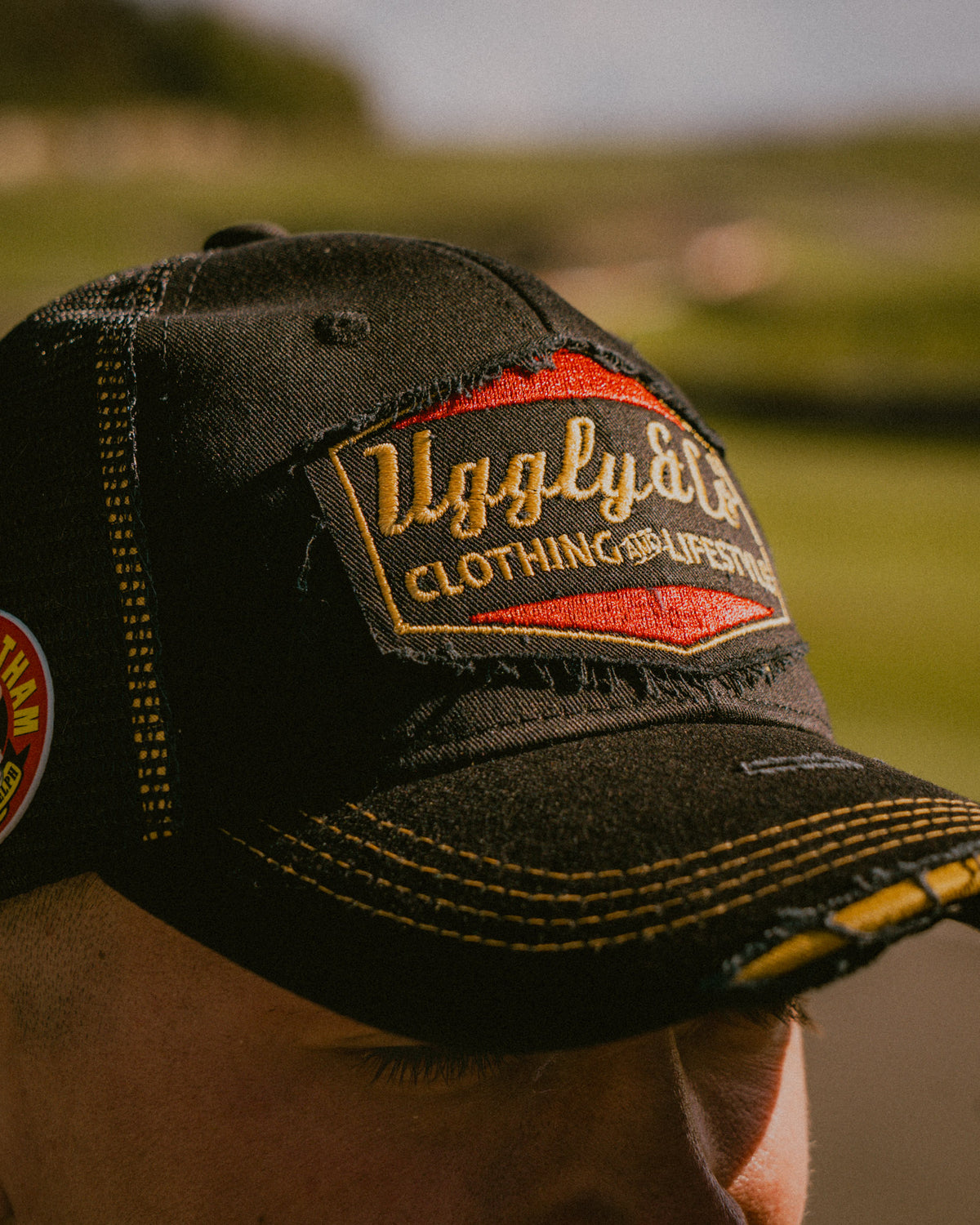 Close-up of the front logo on the Bathams Racing Diamond Trucker Hat