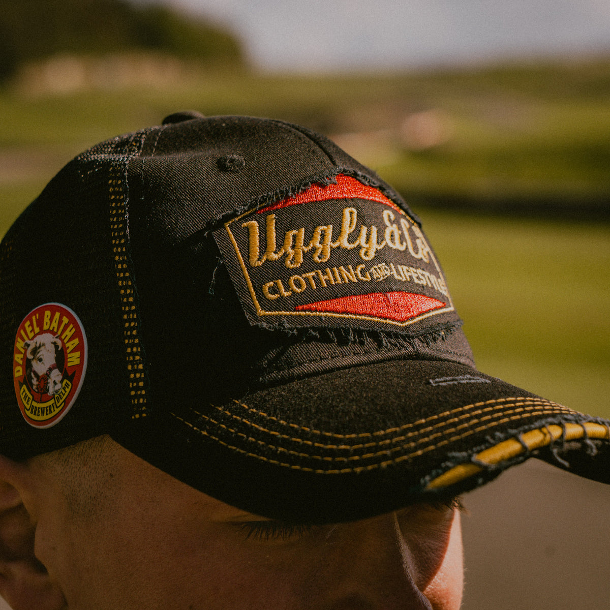 Close-up of the front logo on the Bathams Racing Diamond Trucker Hat