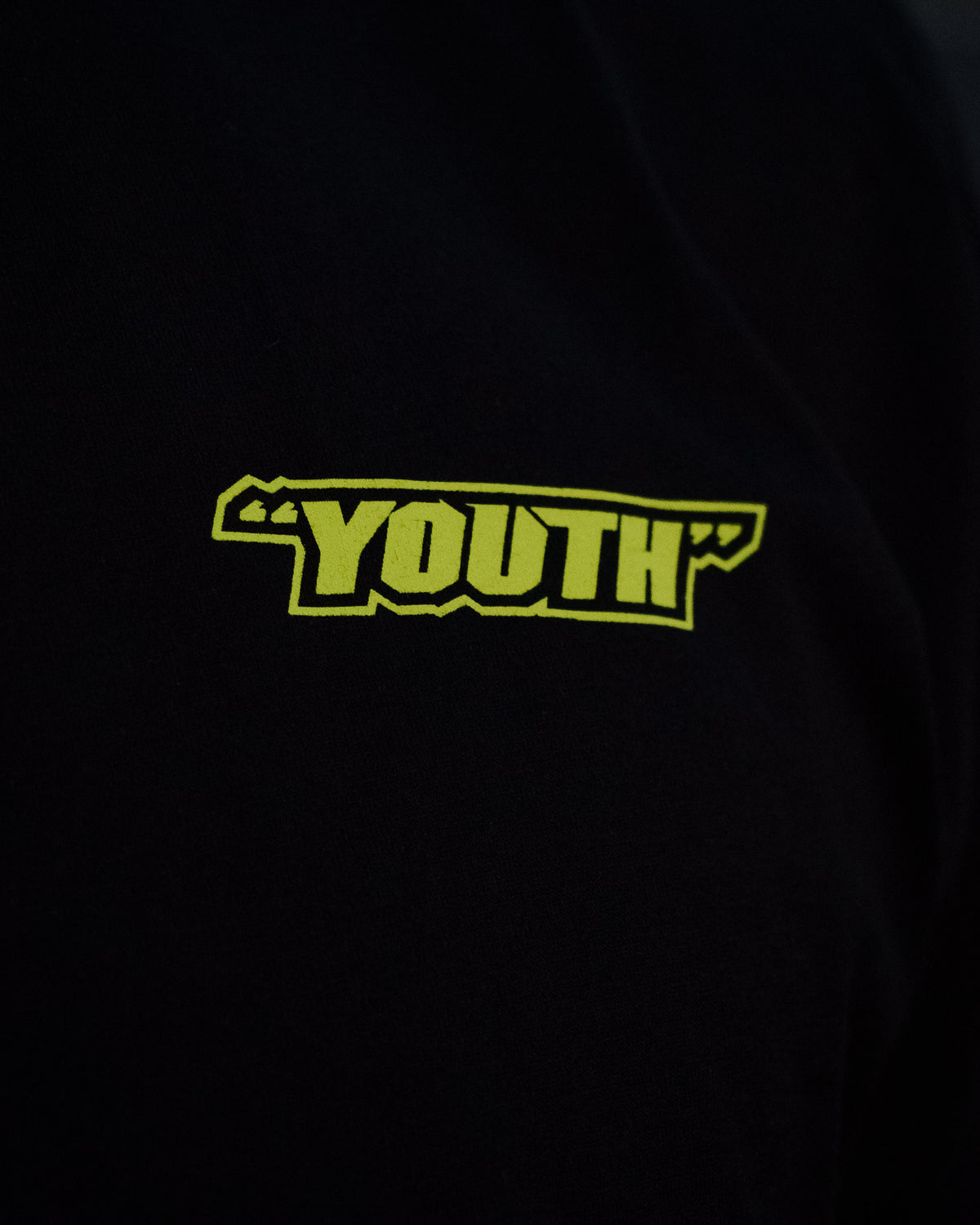 Black Kyle Ryde Graphic T-Shirt youth logo close up