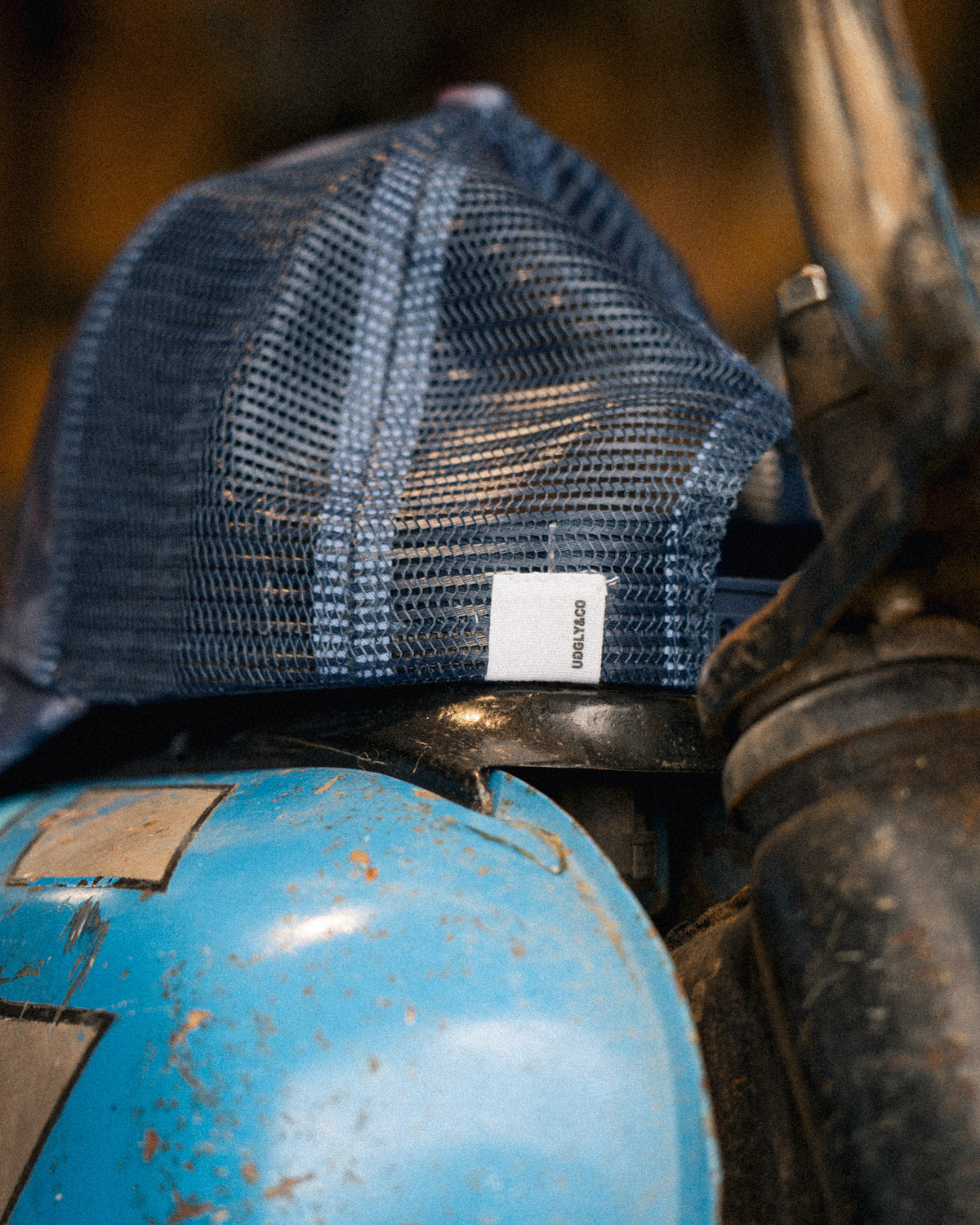 Close up of the Blue Camo Diamond Trucker Hat logo