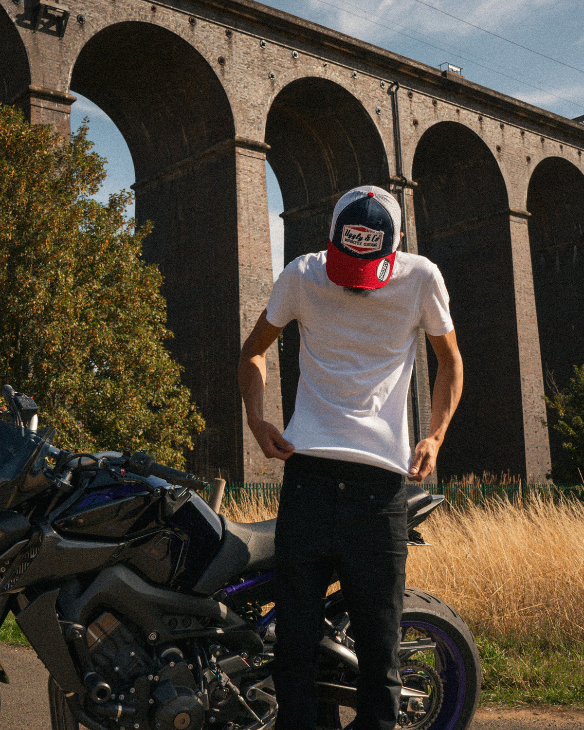 Biker model wearing the Blue and Red Diamond Hat