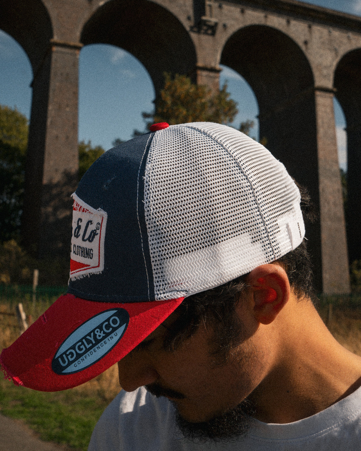 Side view of the Blue and Red Diamond Trucker Hat