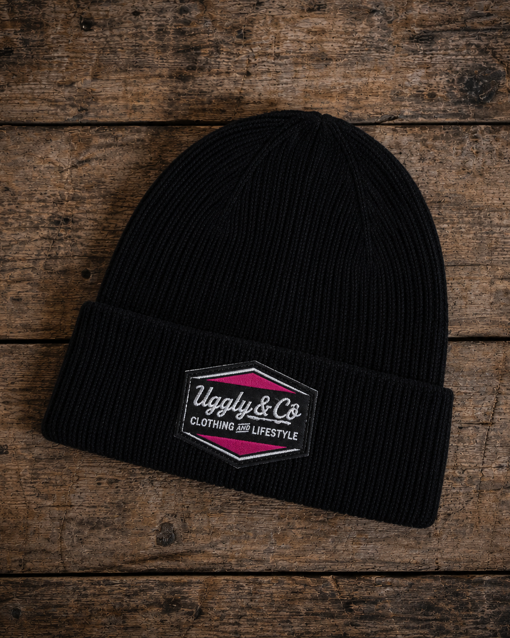 black and pink beanie with race inspired numbers, brad ray signature, diamond logo