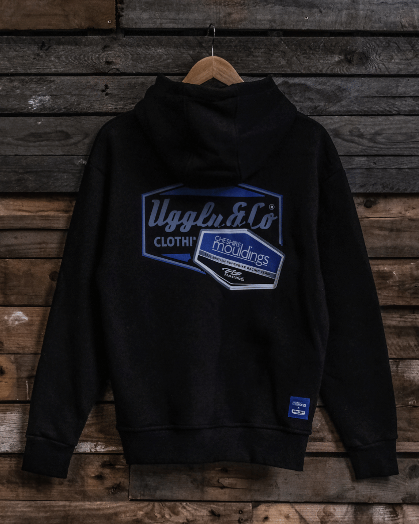 Black hoodie with blue logo on a wooden background