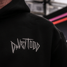 Black hoodie with 'DAVEYTOOD' logo on the back, blurred background
