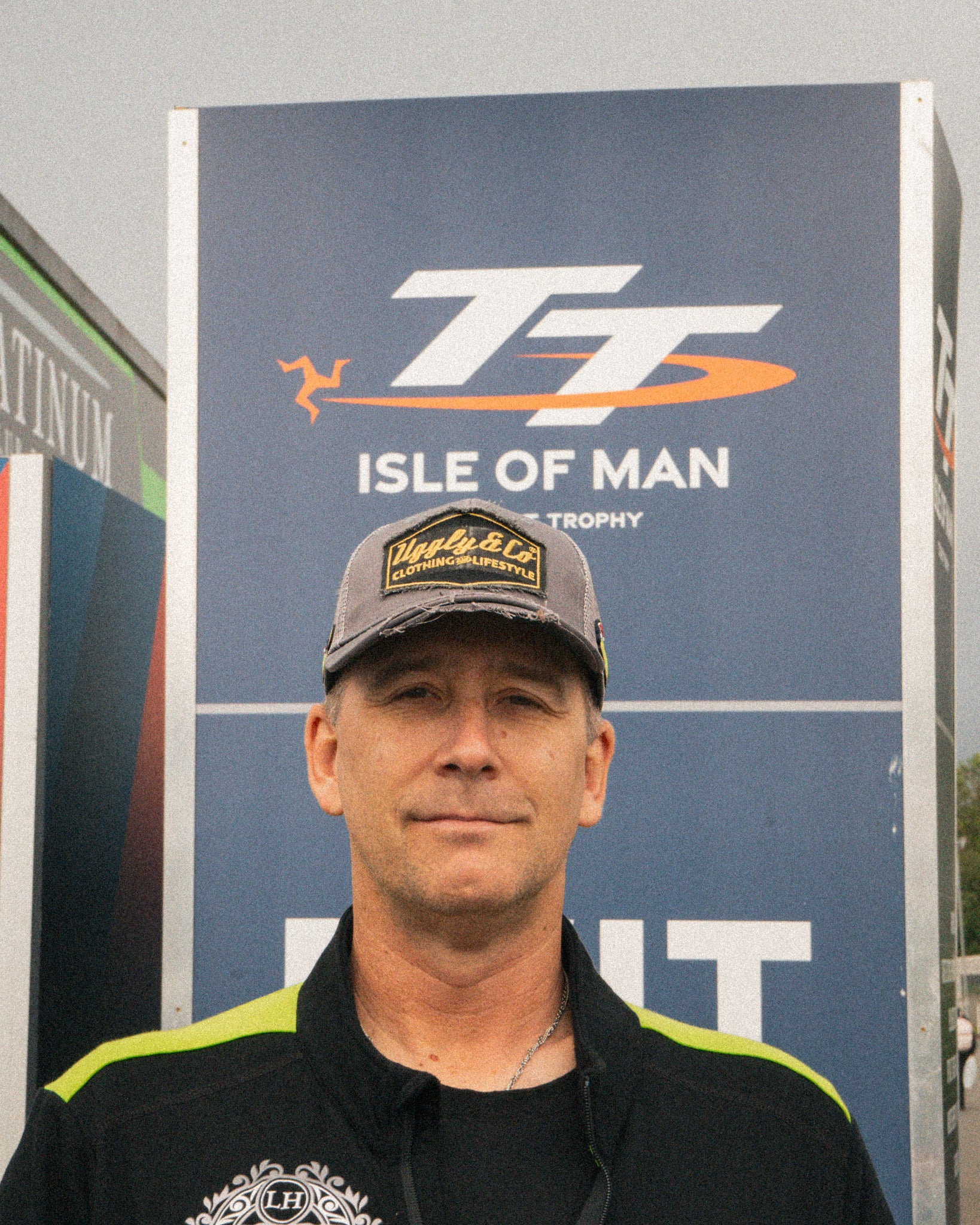 Close-up of the embroidered logo on the Davo Johnston trucker hat