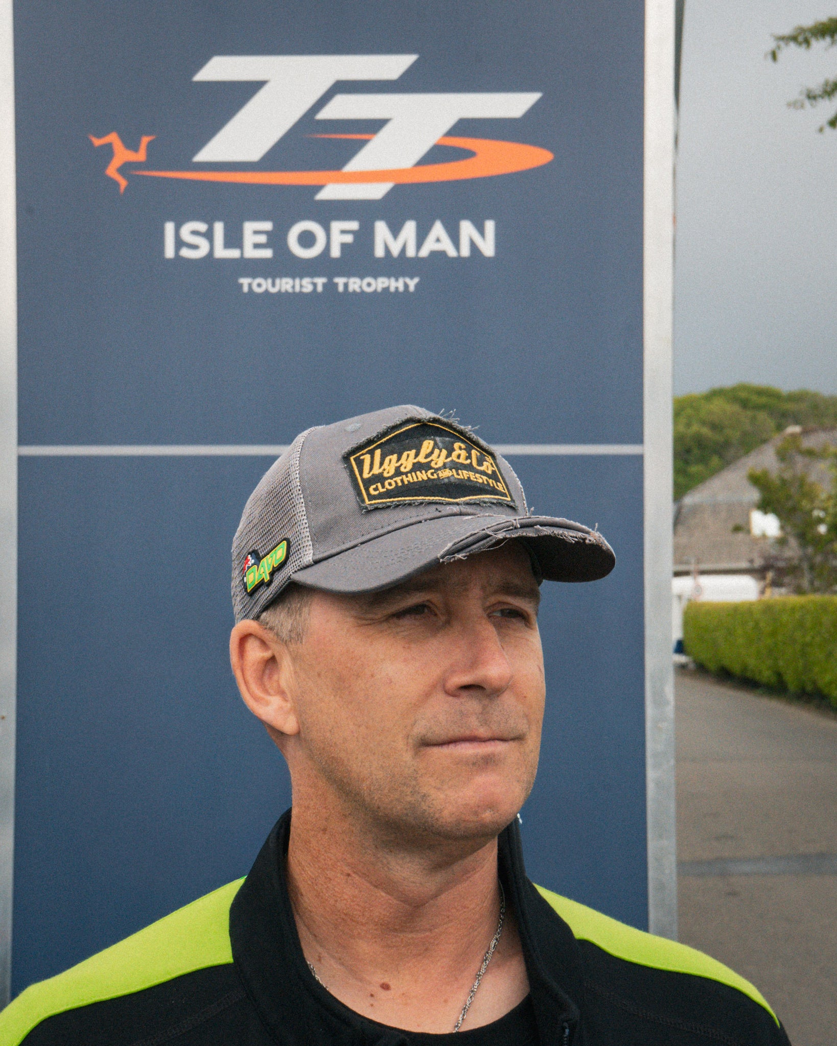 Davo Johnston wearing the Uggly&Co trucker hat in the race paddock