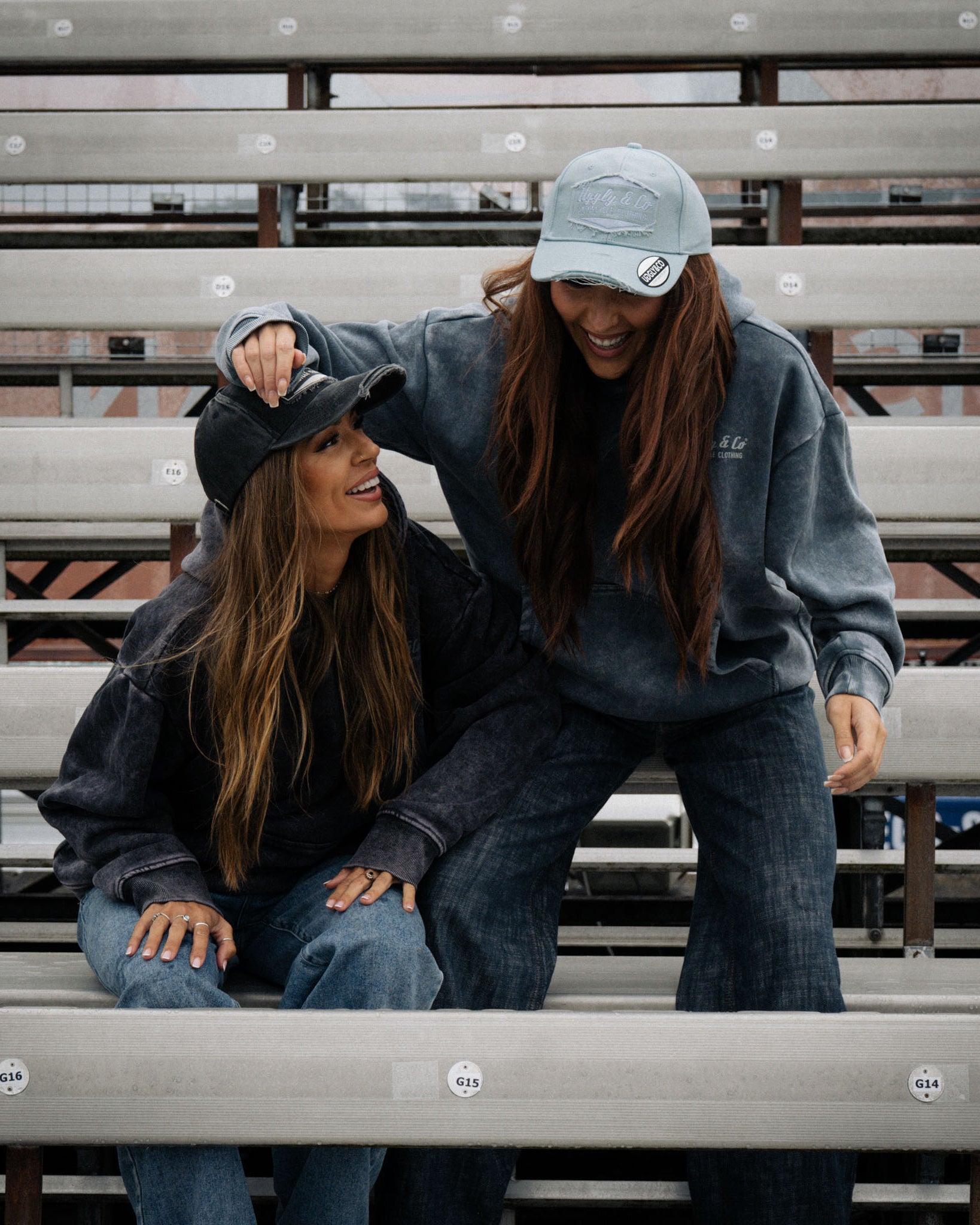 female models wearing vintage clothing in race grandstand