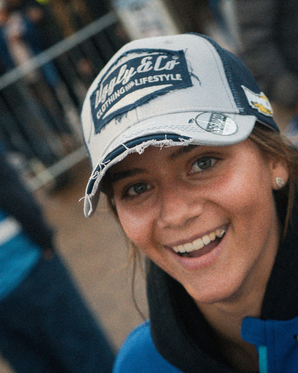 Katie Hand wearing the Uggly&Co Off White and Navy Diamond Cap