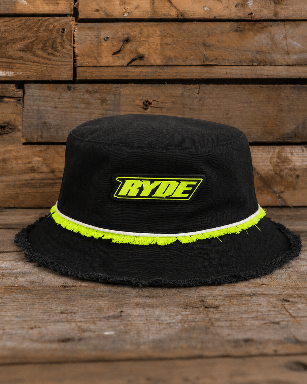 Kyle Ryde Diamond Bucket Hat front product photo featuring black fabric, neon yellow detailing and Ryde logo patch.