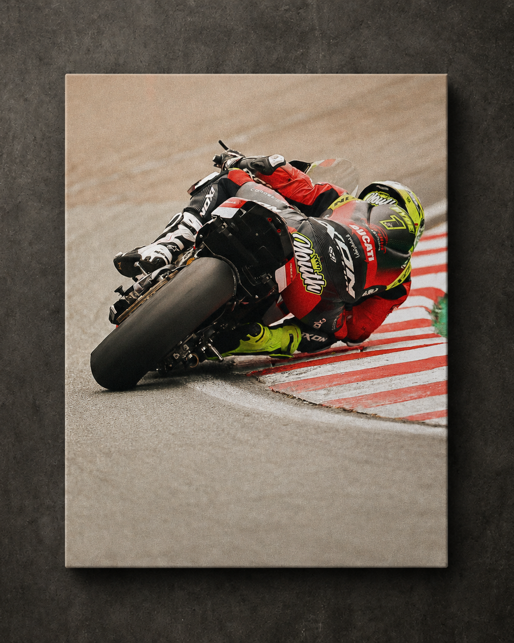 Kyle Ryde leaned over through a wet corner during a British Superbike race, shown as canvas wall art.