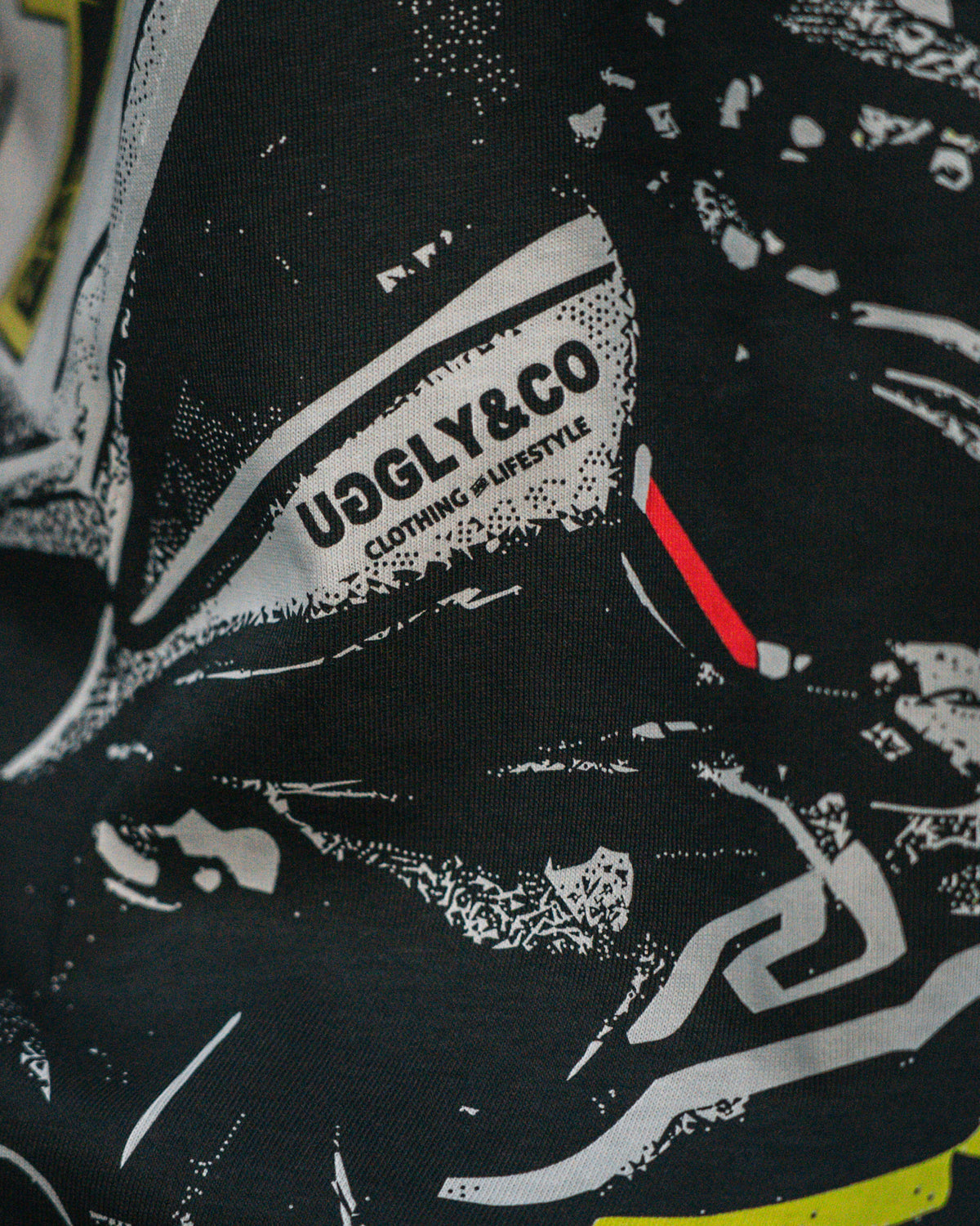 Close-up of the graphic print on the white Kyle Ryde T-Shirt from Uggly & Co's British Superbikes motorcycle clothing collection.