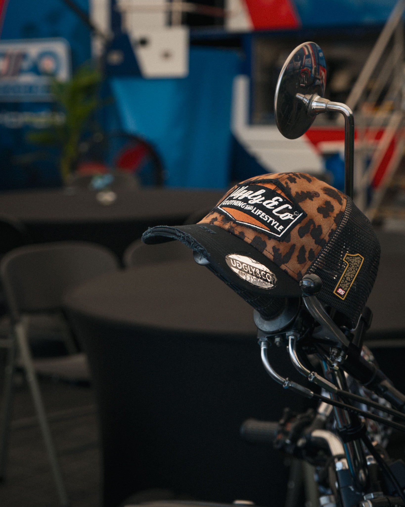 leopard print cap on a motorbike, lifestyle photo