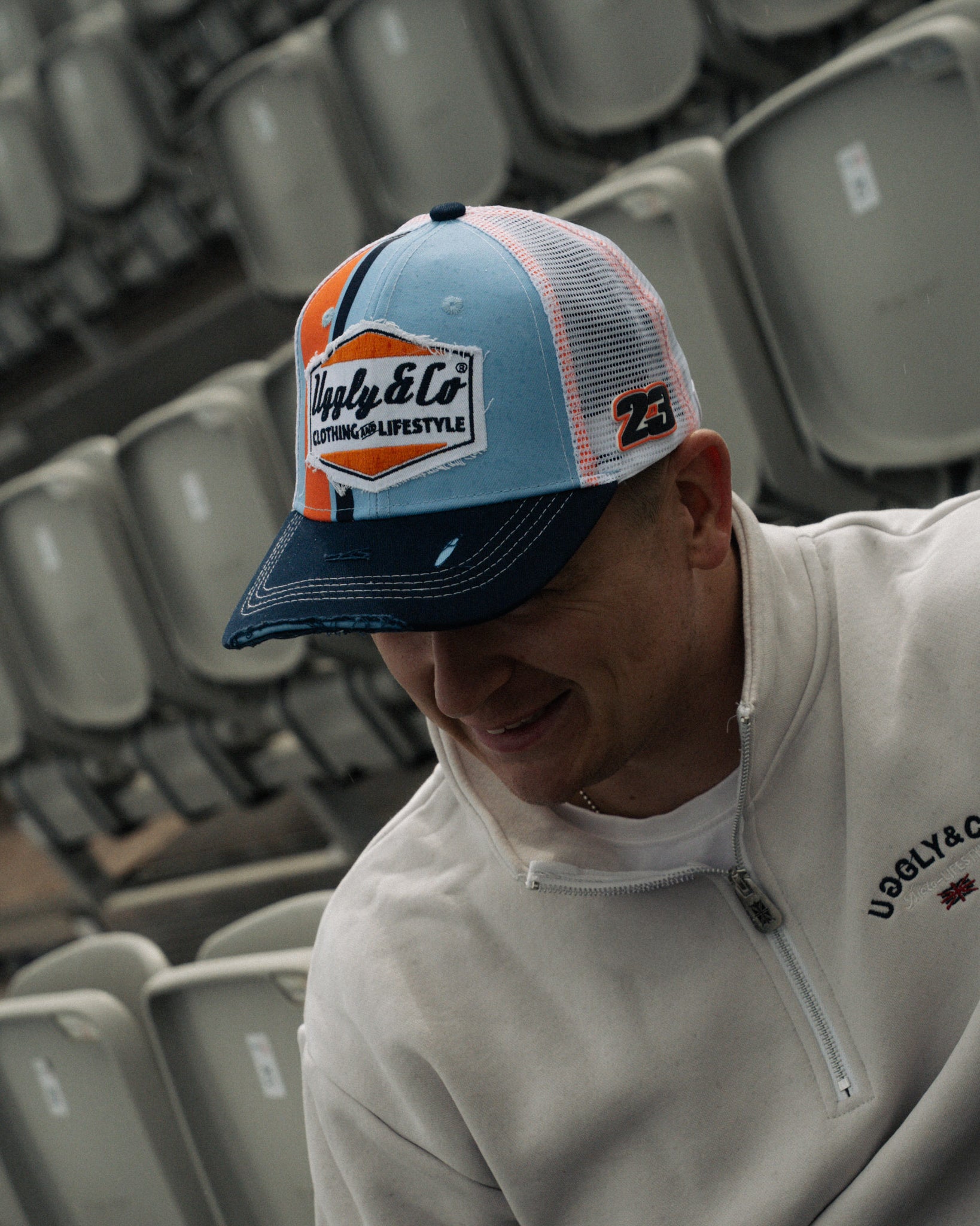 Marcus Simpson wearing signature diamond hat in grandstand