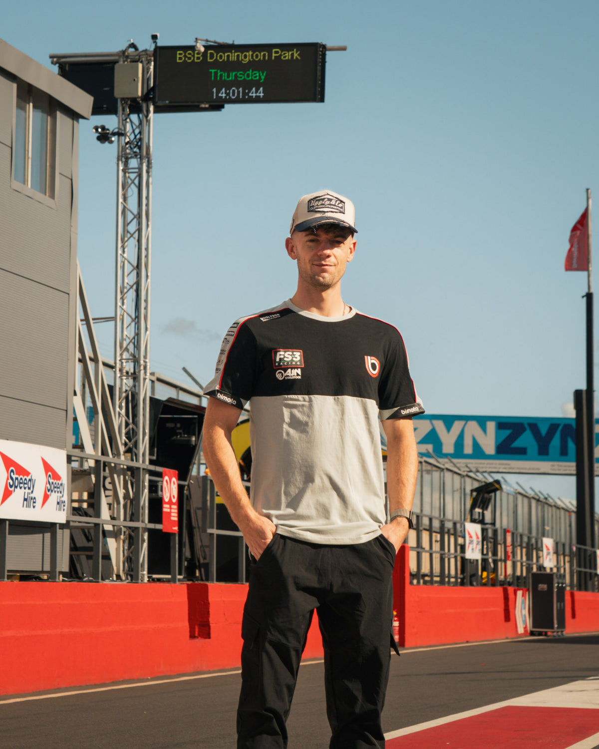 max cook in the pit lane wearing biota fs-3 t-shirt