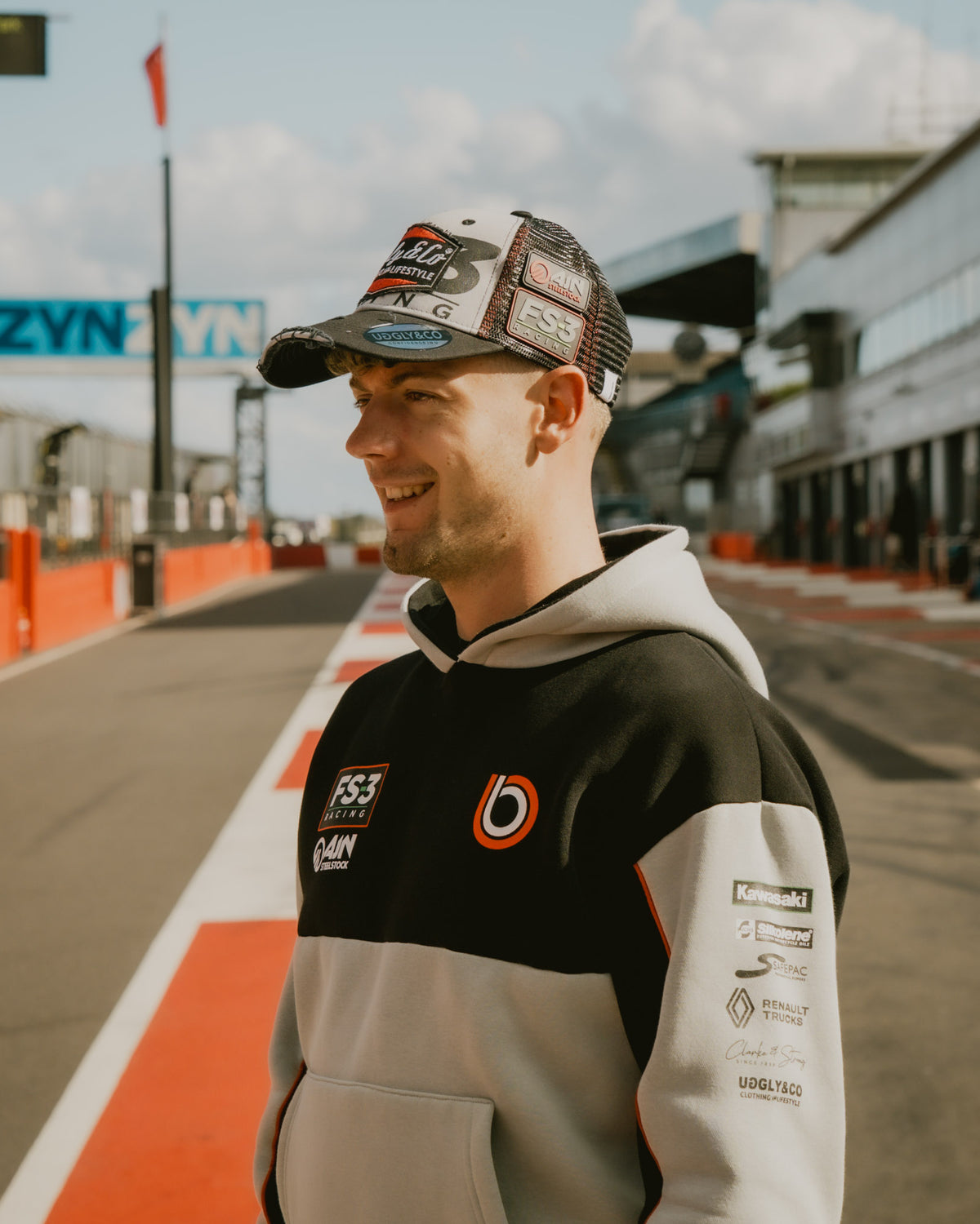Max Cook wearing the FS-3 Superbike Racing Trucker Hat in the British Superbike pit lane