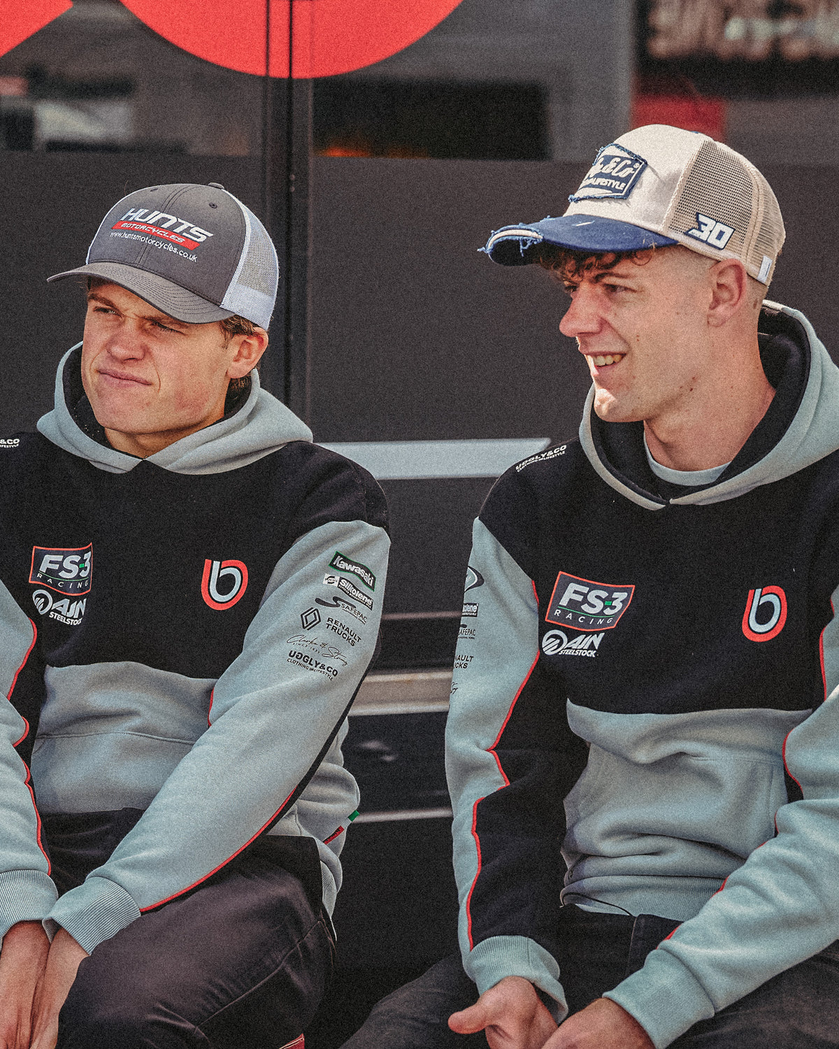 Max Cook and Joe Talbot in the black and grey Bimota Racing team hoodie with FS3 Racing branding