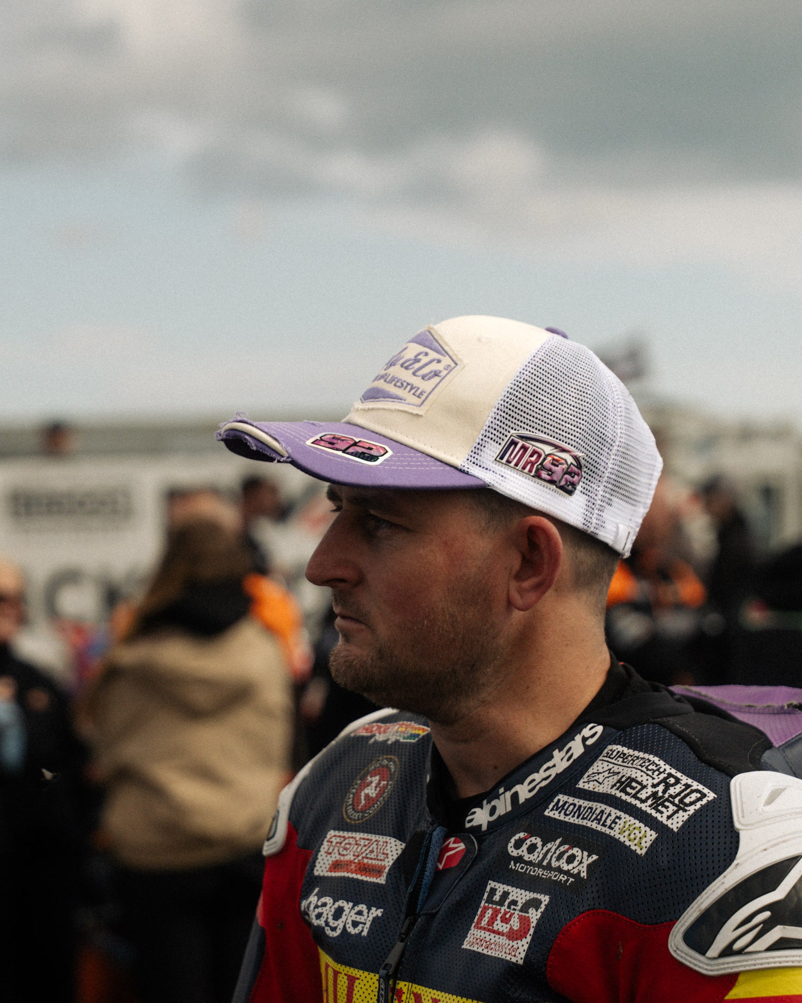 Mitch Rees wearing trucker hat at motorbike race