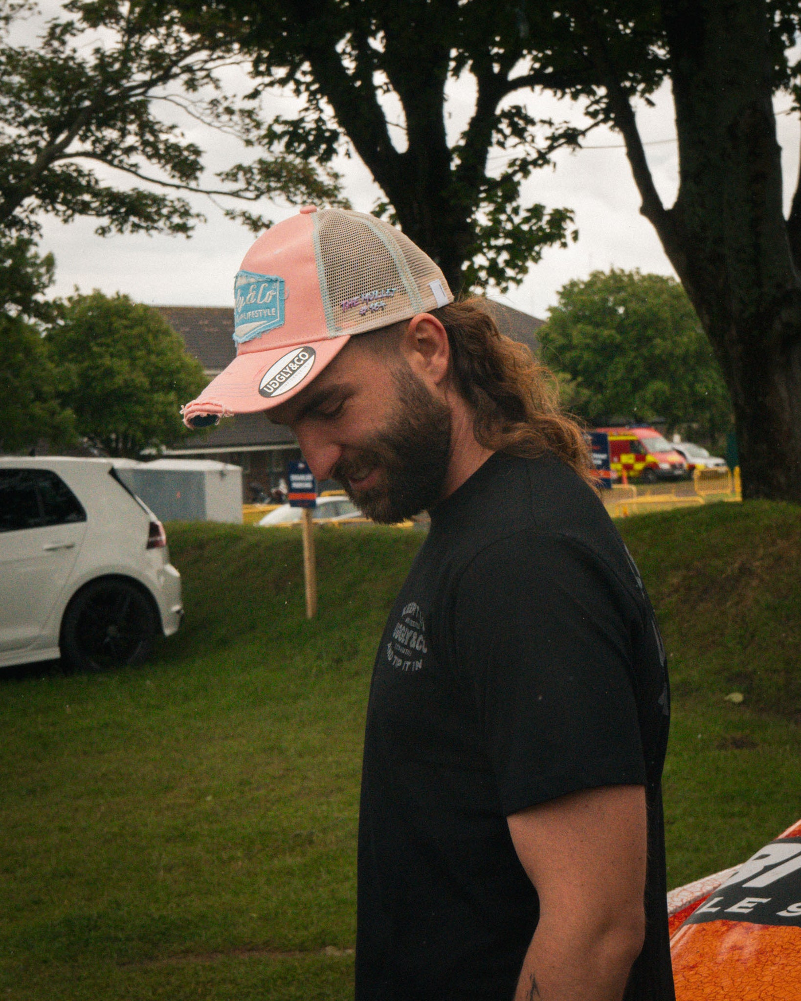 Pastel pink and blue Diamond cap styled on Matt Stevenson