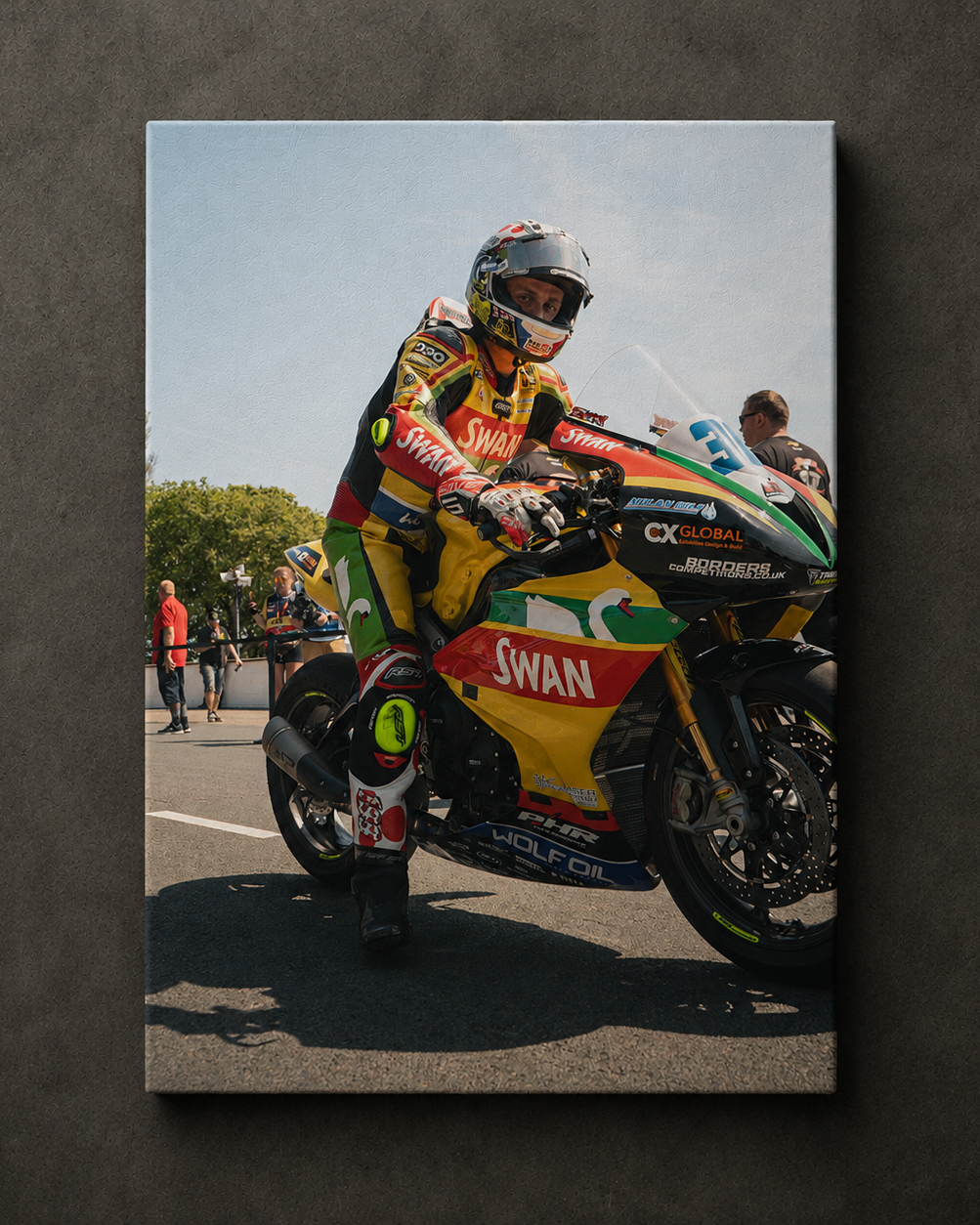 Pierre Yves Bian preparing on the Isle of Man TT grid before heading out onto the Mountain Course, shown as canvas wall art.