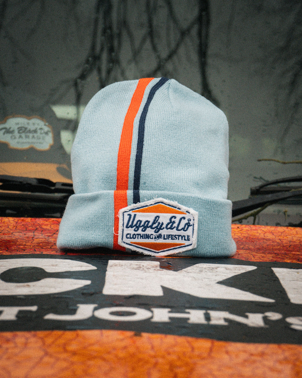Retro Diamond Light Blue & Orange Marcus Simpson Signature Beanie with bold knit pattern
