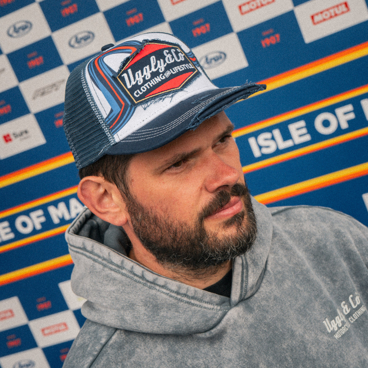 Shaun Anderson wearing the Retro Blue & Red Diamond Trucker Hat
