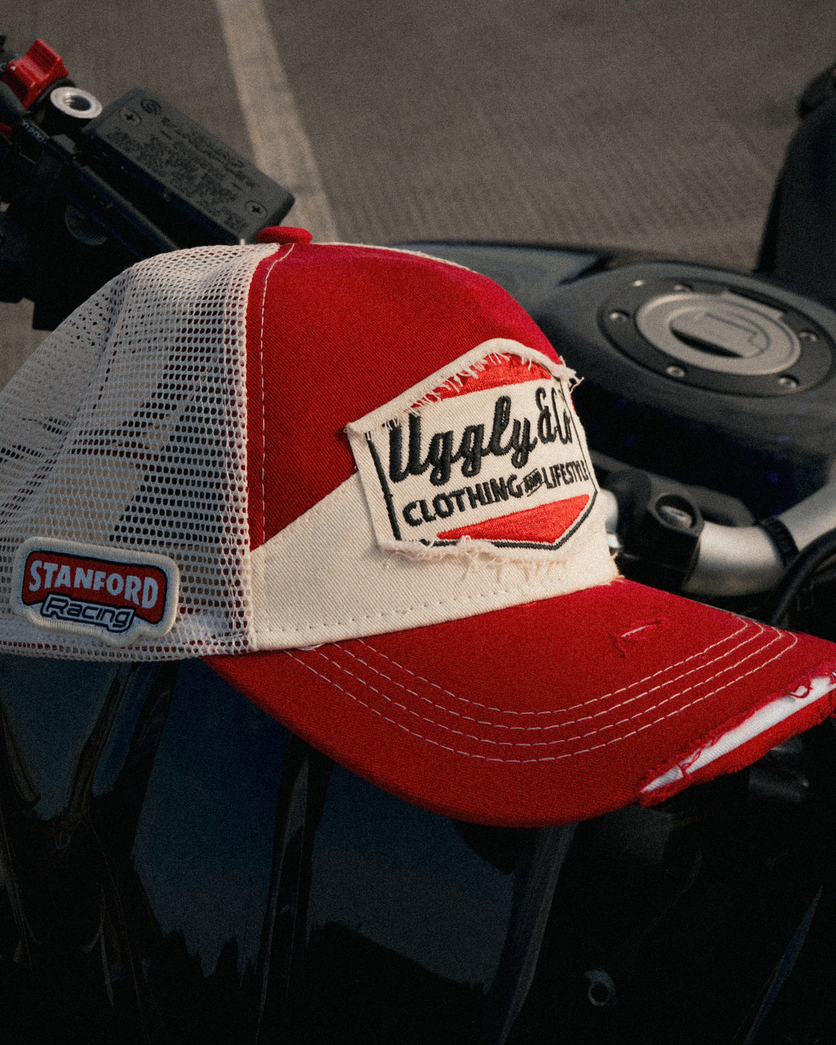 Side view of the Smokin’ Red Label Diamond Trucker Hat. Marlboro inspired