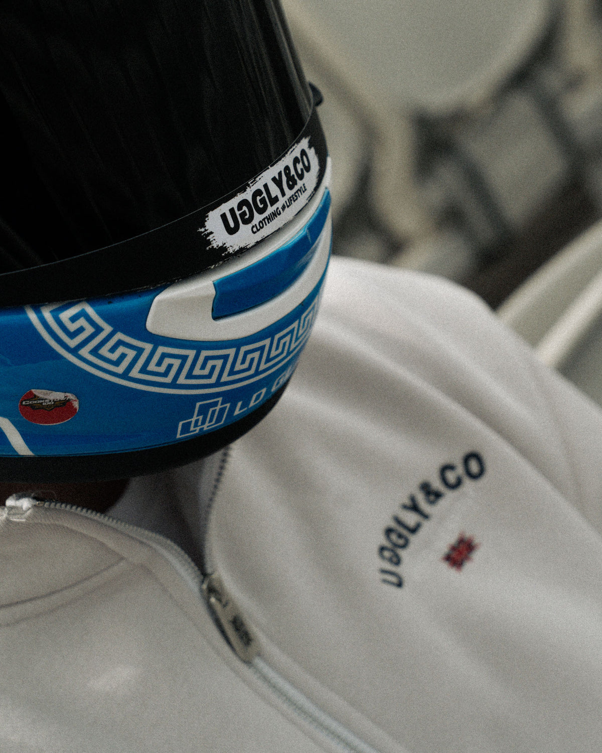 close up shot of Marcus Simpson wearing stone quarter zip