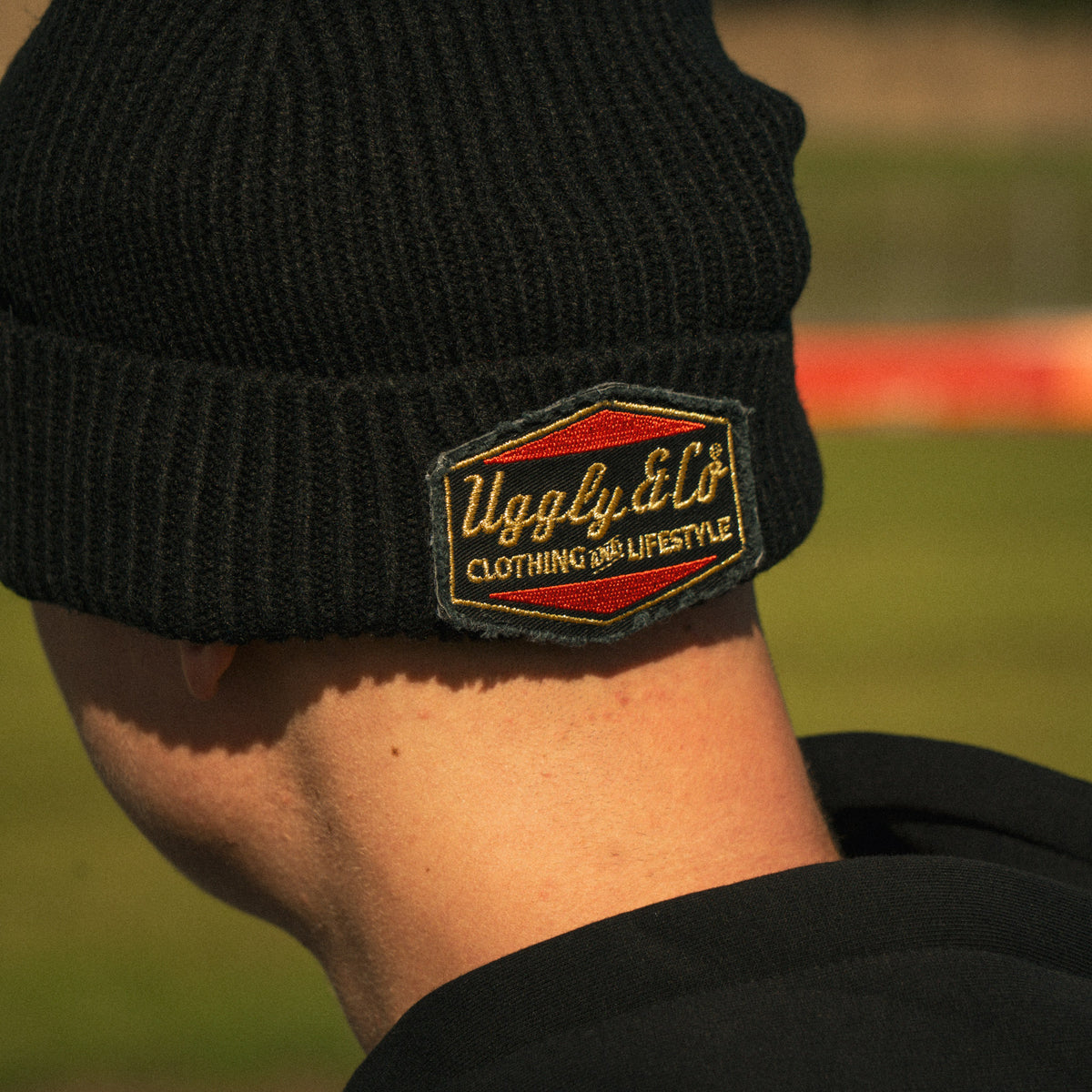 Back view of Storm Stacey wearing the Bathams Racing x Diamond Beanie