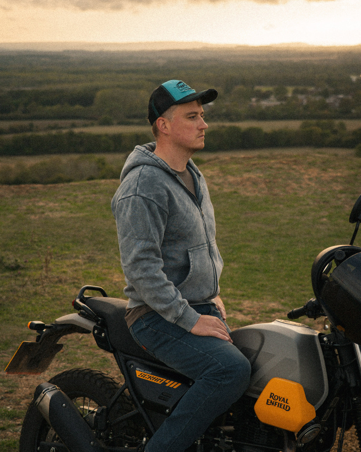 Uggly & Co Turquoise & Black Diamond Cap styled alongside a Scram 411 motorcycle