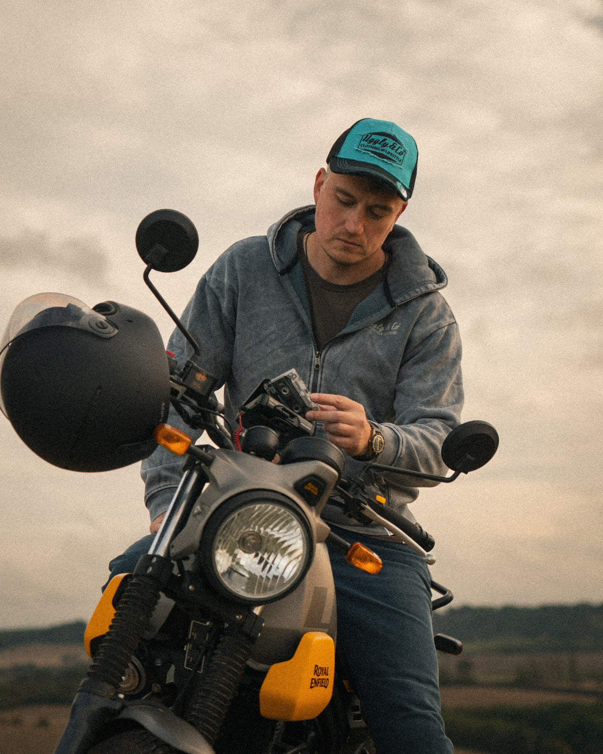 Turquoise & Black Diamond Cap photographed with a Royal Enfield Scram 411