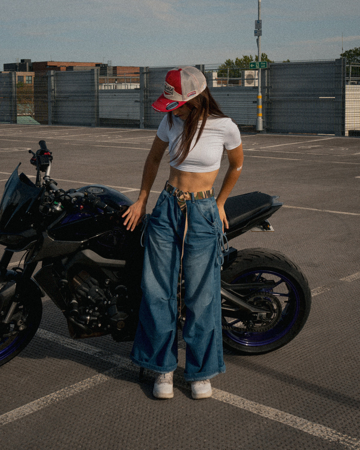 Female model wearing uggly and co Marlboro cap