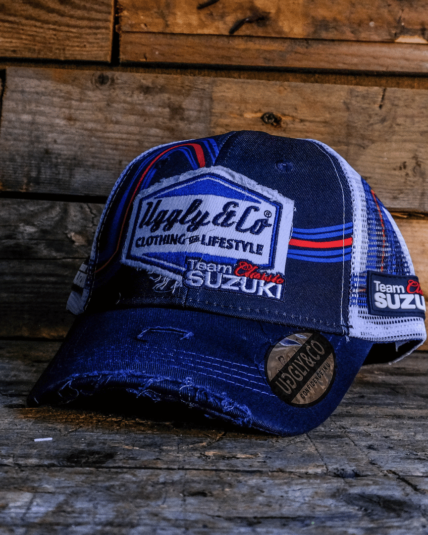 Team Classic Suzuki trucker hat on blue, red and white, with a mesh back and an Uggly&Co diamond logo on the front
