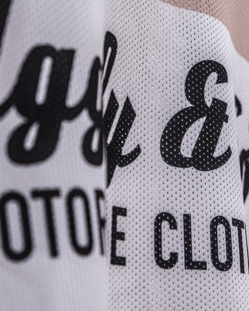 Close up of the long-sleeve motocross jersey with 'Uggly & Co Motorcycle Clothing' logo