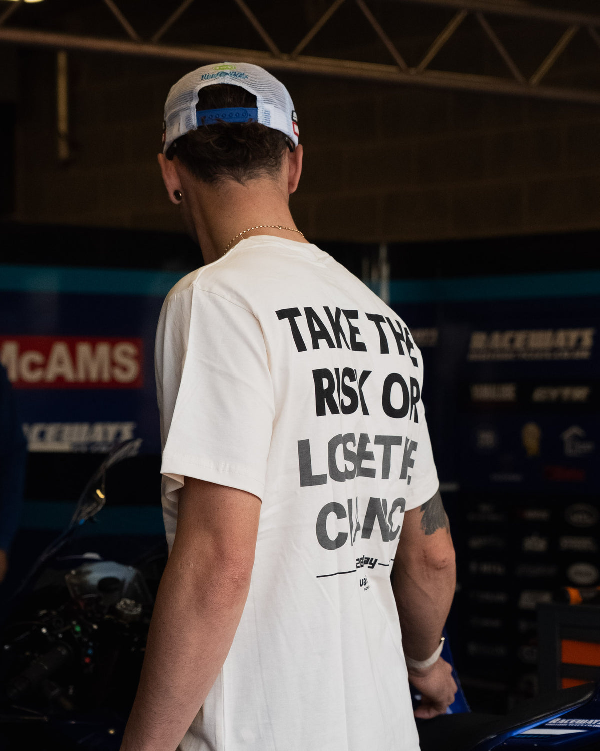 Bradley Ray 'Take the Risk' T-Shirt photographed in mcams garage