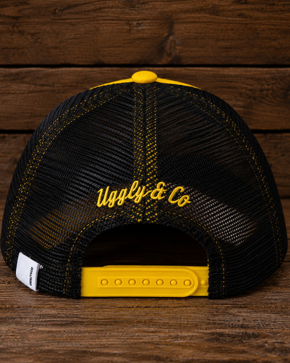 Back view of the Yellow & Black Diamond Cap showing the adjustable trucker fit.