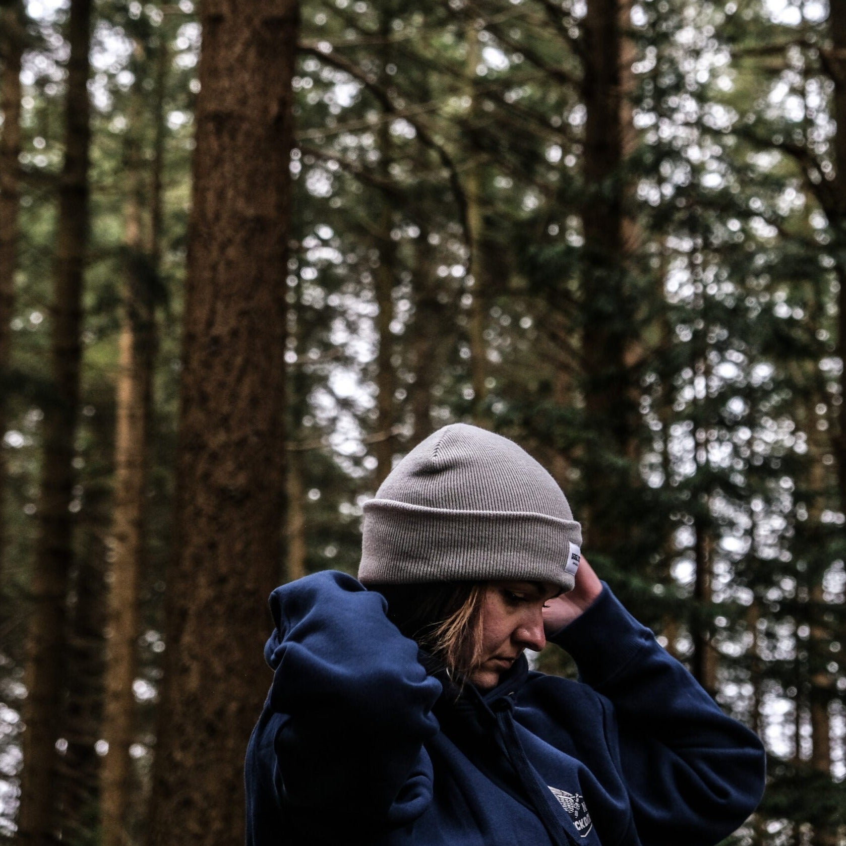 A Uggly&Co light grey heather beanie on the tank of a Royal Enfield on a unique photoshoot with @wreckitwren on instagram