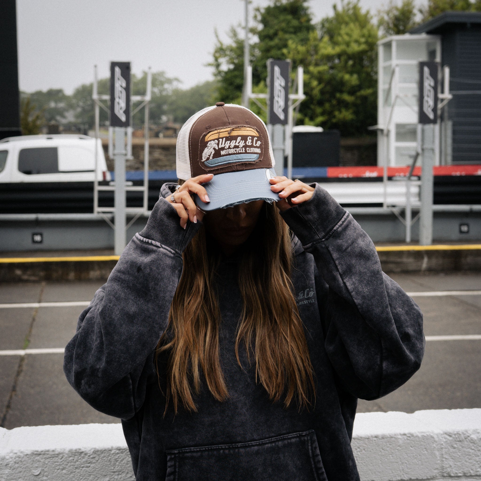 brown and blue flat track cap