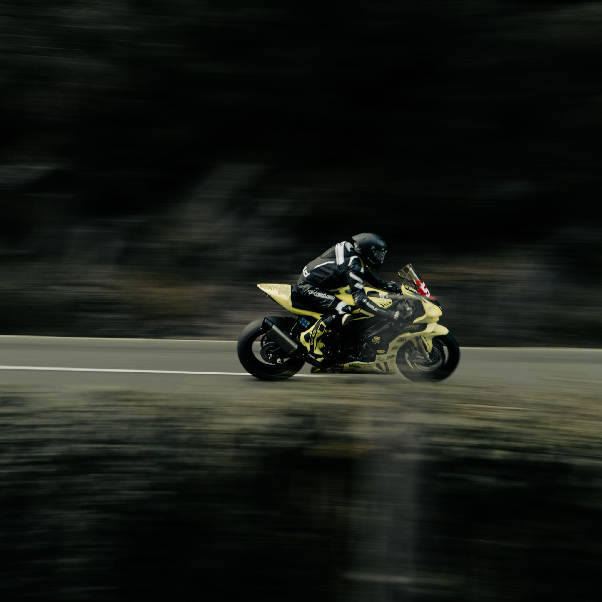 panning shot of motorbike rider at the Isle of Man tt