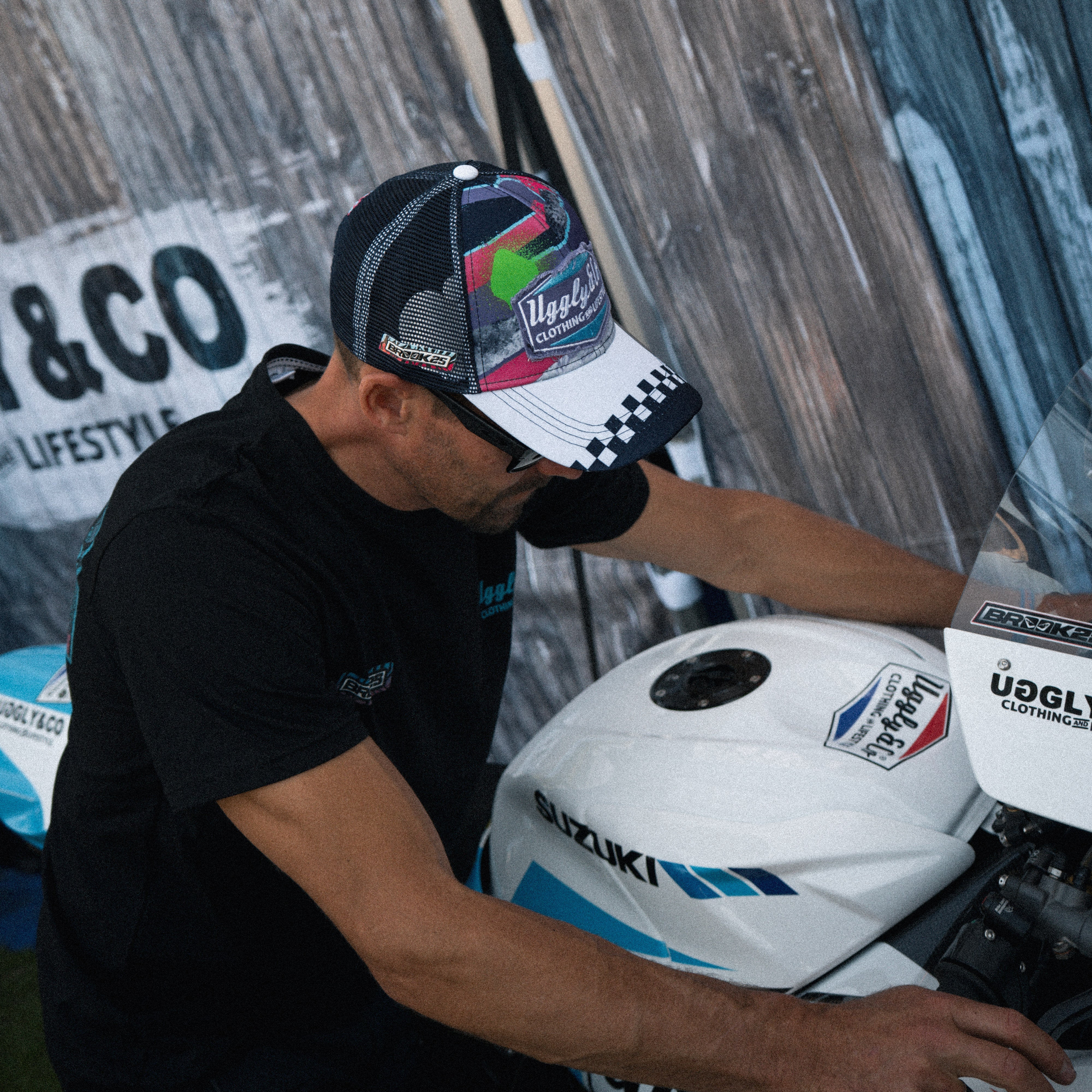 Josh Brookes on his TT bike in motocross inspired trucker hat