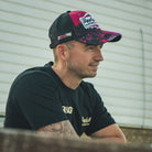 Biker wearing signature Bradley ray cap