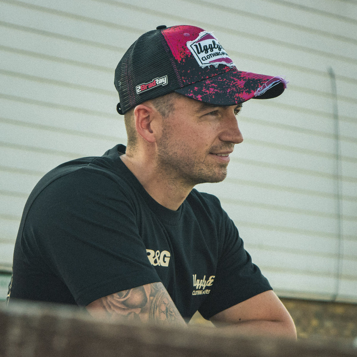 Biker wearing signature Bradley ray cap