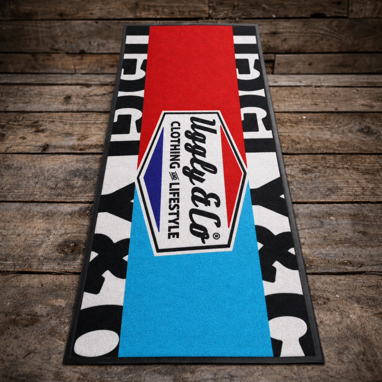 Colorful motorcycle matt with a brand logo on a wooden floor